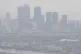 The view of London's Canary Wharf through the smog