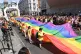 People take part in the Pride in London Parade in central Lo