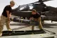 British Army Air Corps Ground Crew reload a Hellfire Missile