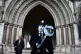 A demonstrator outside the Royal Courts of Justice, London