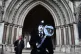 A demonstrator outside the Royal Courts of Justice, London, 