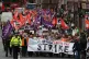 Strikers march to Glasgow Council's city chambers for a mass