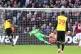 Watford's Troy Deeney scores his side's first goal of the ga