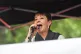 Green Party leader Caroline Lucas speaking on stage at an an
