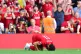 Liverpool's Mohamed Salah celebrates scoring his side's thir