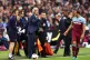 West Ham United manager Manuel Pellegrini speaks with Mark N
