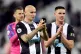Shelvey and Clark celebrate after a hard-won win