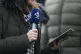 A presenter holds a Channel 4 branded microphone