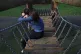 A teenage girl in a park showing signs of mental health issu