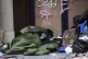A homeless man sleeping in the doorway of closed down branch