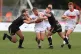 Hull KR's Mikey Lewis is tackled by Leigh Centurions' Thomas