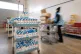 A worker for Birmingham council prepares food parcels for th