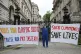 Nurse Ameera Sheikh protests outside Downing Street, London,
