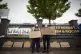 Activists from Stand Up to Racism hold a demonstration to de