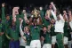 South Africa's Siya Kolisi (centre) lifts the trophy as Sout