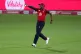 England's Chris Jordan celebrates taking the catch to dismis