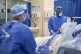 Health workers wearing full personal protective equipment (P