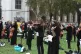 Musicians perform during a protest calling for more funding 