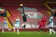 Liverpool goalkeeper Caoimhin Kelleher saves a shot during t