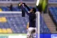 Millwall's Mahlon Romeo holds up a shirt with Kick It Out sl