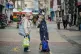 People chat on the High Street in Merthyr Tydfil, the area w