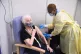 Colleen York receiving a Covid-19 vaccine at the NHS Nightin