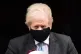 Prime Minister Boris Johnson leaves 10 Downing Street to att