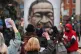 Black Lives Matter demonstrators take a knee during a 'Kill 