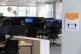 A poster (right) specifying social distancing requirements i