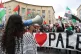 Demonstrators on Broadmead in Bristol during a march in soli