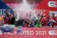 Morecambe players celebrate with the trophy after the Sky Be
