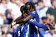 Chelsea's Trevoh Chalobah celebrates with team-mate Mason Mo