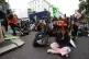 Demonstrators sit on the A4 outside the Natural History Muse
