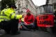 A police officer speaks to one of the campaigners from Green