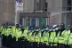 Officers lining the offices of JP Morgan in Glasgow on Satur
