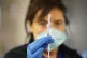 Retired nurse manager Siobhan Boyle administers a covid vacc