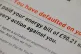 An energy bill claiming that the customer has defaulted on p
