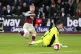 West Ham United's Jarrod Bowen (left) scores their side's se