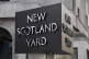 The New Scotland Yard sign outside the Metropolitan Police h