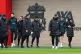 Liverpool manager Jurgen Klopp (third right) leads his playe