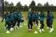Focused: Liverpool’s Jordan Henderson (centre) and team-ma
