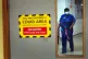 A nurse walking through a covid ward at King's College Hospi