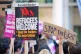 Demonstrators protest outside the Home Office in London