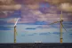A ship passes wind turbines at RWE's Gwynt y Mor, the world'