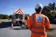A worker from Thames Water delivering a temporary water supp
