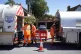 A tanker from Thames Water pumps water into another tanker i