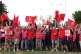Members of the Unite union man a picket line at one of the e