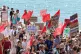 Members of the public and protesters from Hastings and St Le