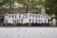 People protest outside the Ofgem HQ in Canary Wharf London, 
