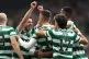 Celtic's David Turnbull (centre) celebrates scoring their si